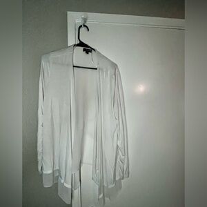 Woman’s White cardigan.